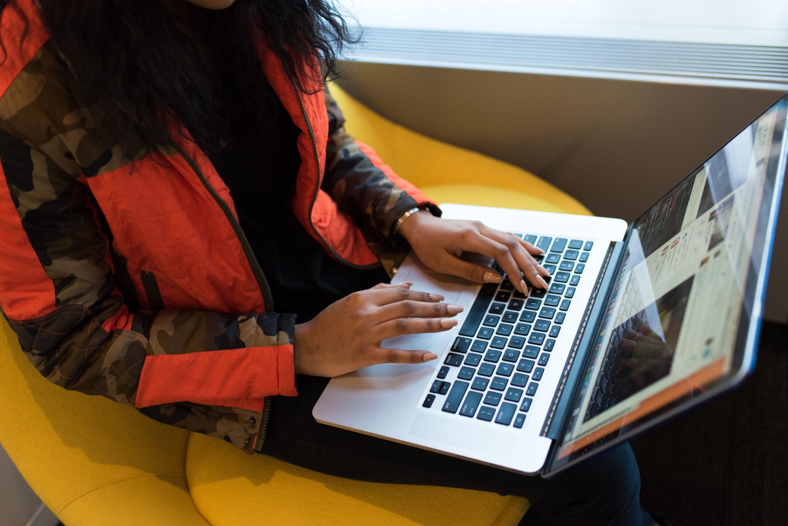 Professional using a laptop for AI productivity and technology work