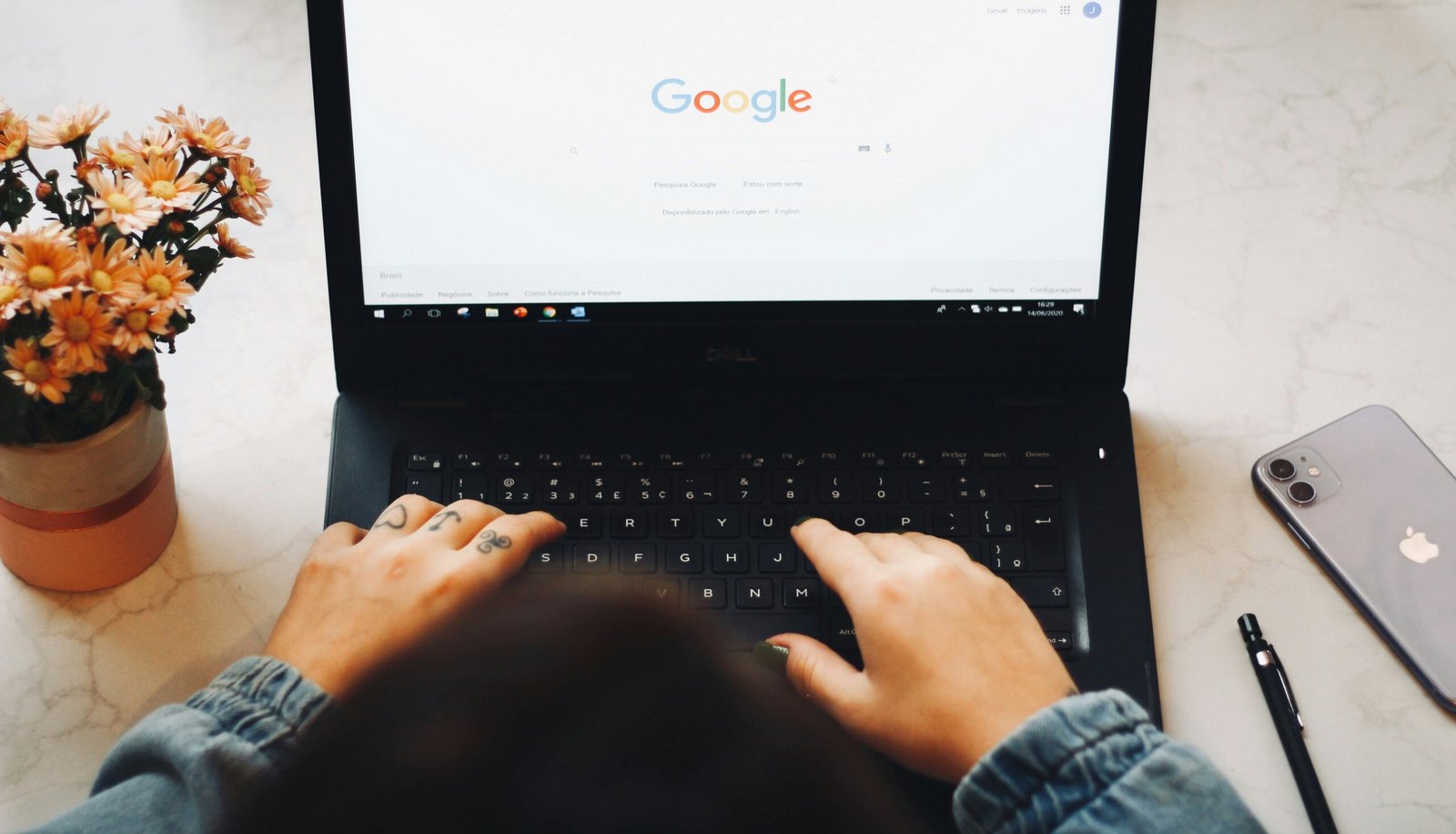 Person using an AI assistant on a laptop computer