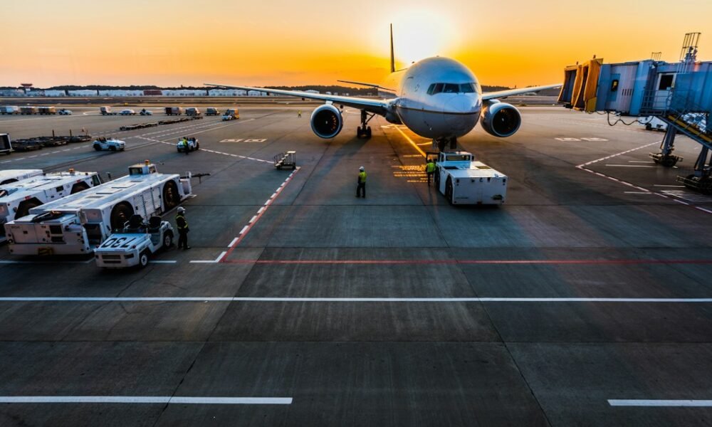 Holiday flights 2026 airplane at a U.S. airport for Thanksgiving and Christmas travel