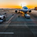 Holiday flights 2026 airplane at a U.S. airport for Thanksgiving and Christmas travel