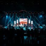 MrBeast Ramayana event news concept with a large promotional stage and audience