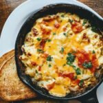 Pizza beans recipe inspired skillet dinner with tomato sauce and cheese