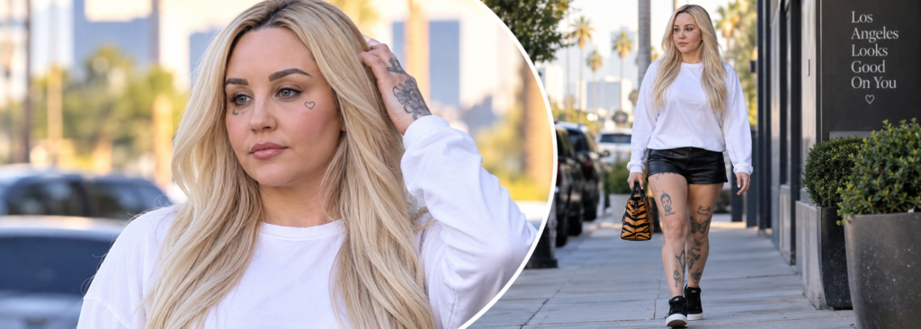 Amanda Bynes weight loss journey in 2026 with leg tattoos and black leather shorts
