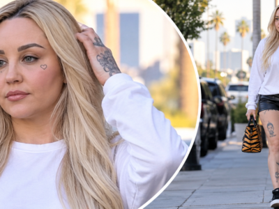 Amanda Bynes weight loss journey in 2026 with leg tattoos and black leather shorts