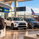 How to rent a car in USA as a tourist with an international traveler collecting rental car keys at a U.S. airport in 2026.